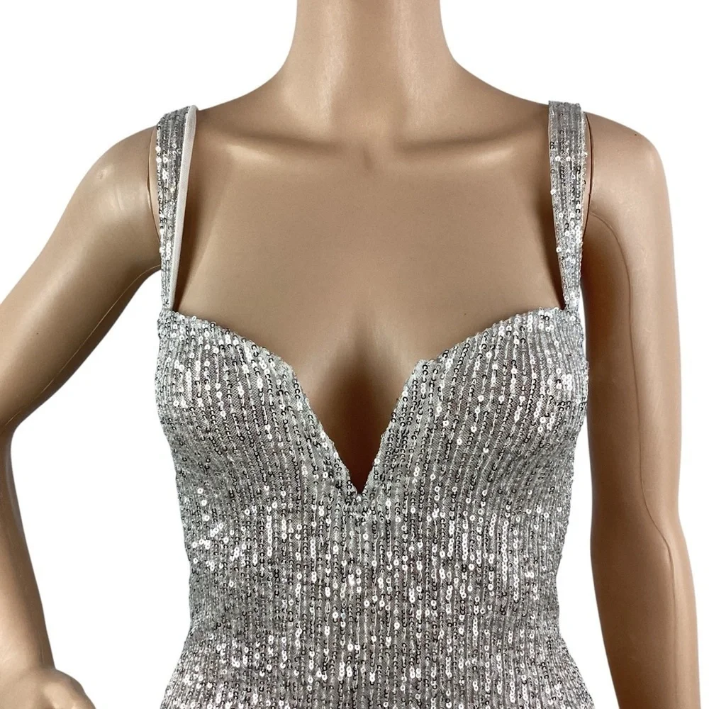 Free People Sparks Fly Thong Sequin Bodysuit Size XS Silver Combo